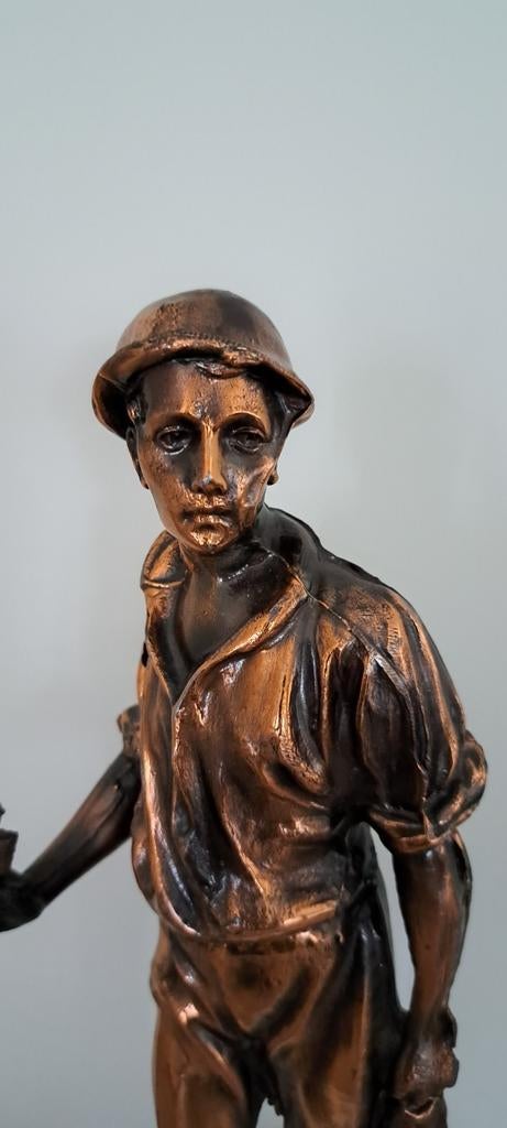 Beeldje van mijnwerker, Enlèvement