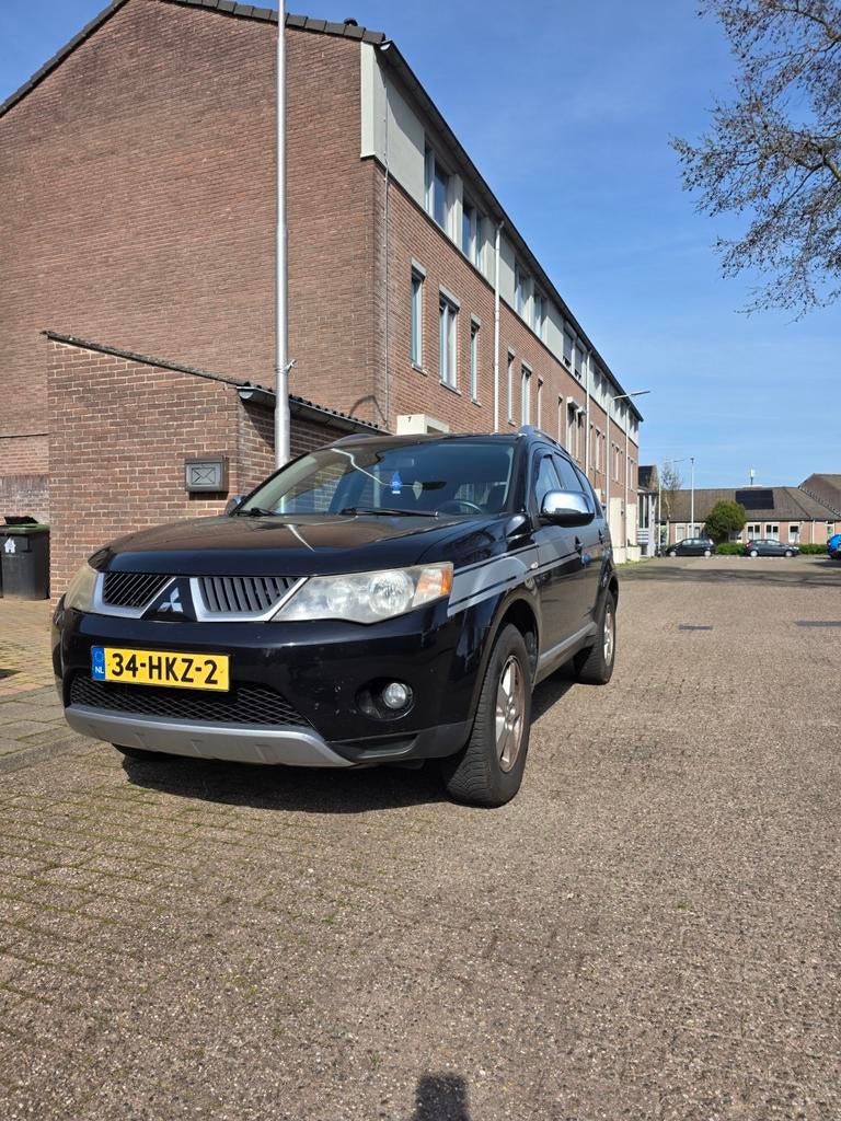 Mitsubishi Outlander 2.4 MPI 2WD 2009 Zwart, Auto's, Mitsubishi, Particulier, Te koop, Outlander
