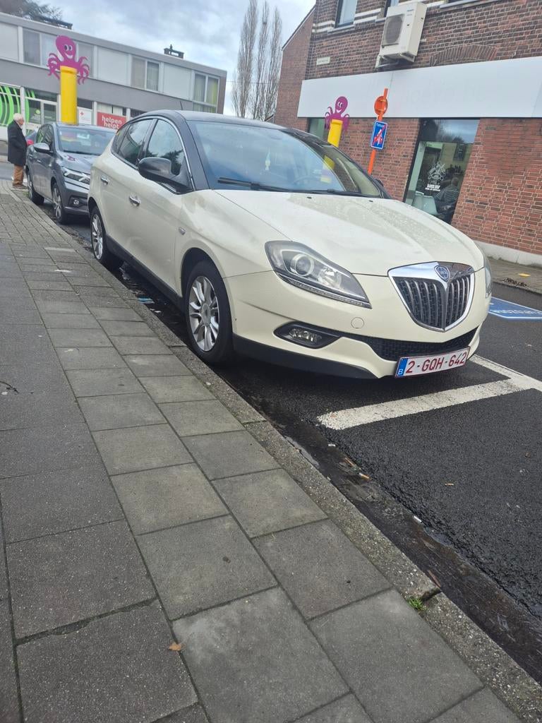 Lancia delta 2010 euro 5 1.6 diesel, Auto's, Euro 5, Diesel, Particulier, Xenon verlichting