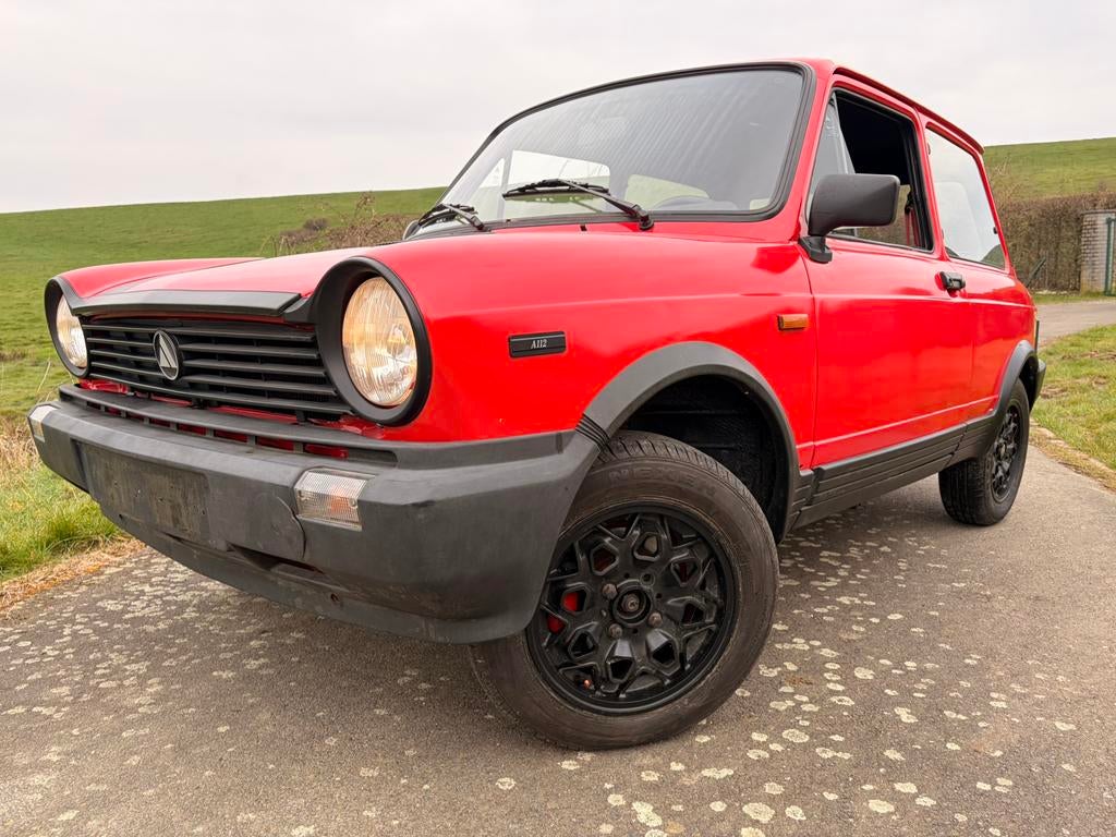 Autobianchi A112 Junior 1982, Auto's, Overige Auto's, Zwart, Leder, Particulier, Rood