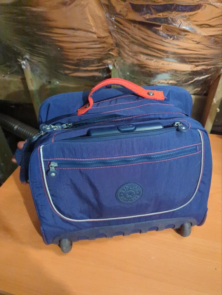 sacoche Kipling, Enlèvement