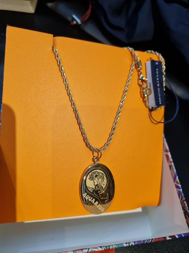 Collier tommy HILFIGER, Enlèvement