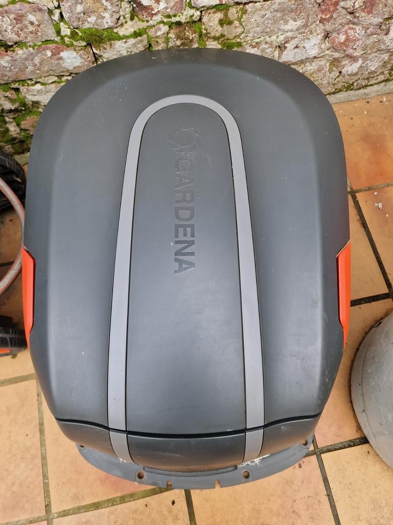 Gardena robotmaaier garage, Enlèvement