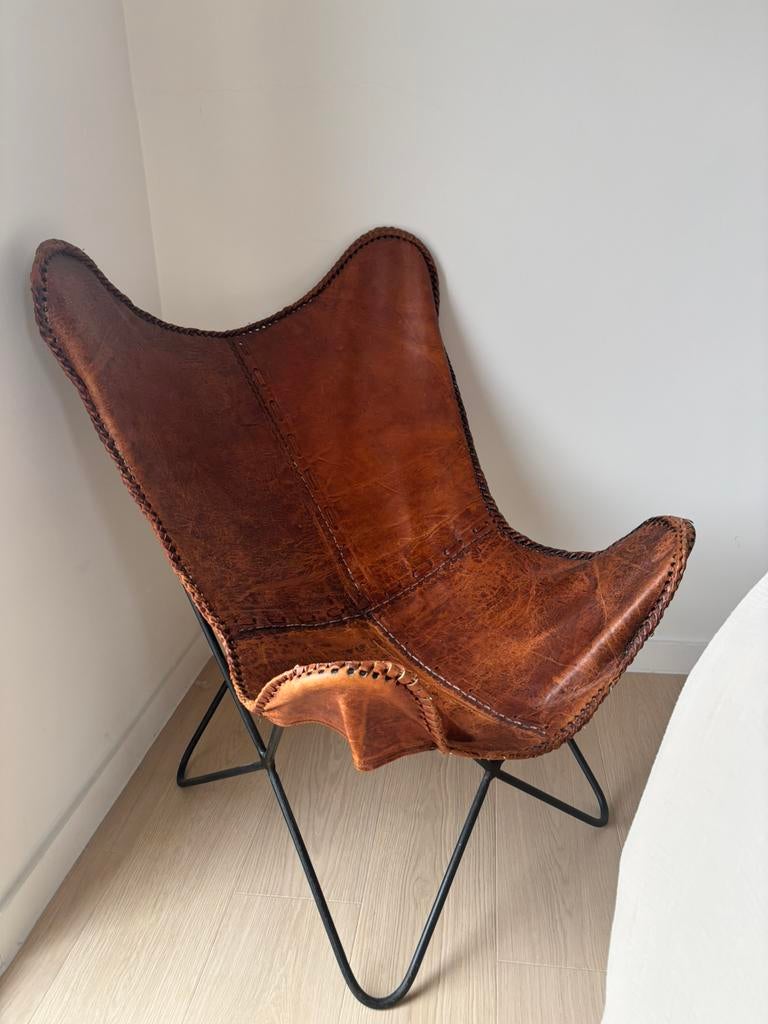 Lederen vlinderstoel, Enlèvement, Comme neuf