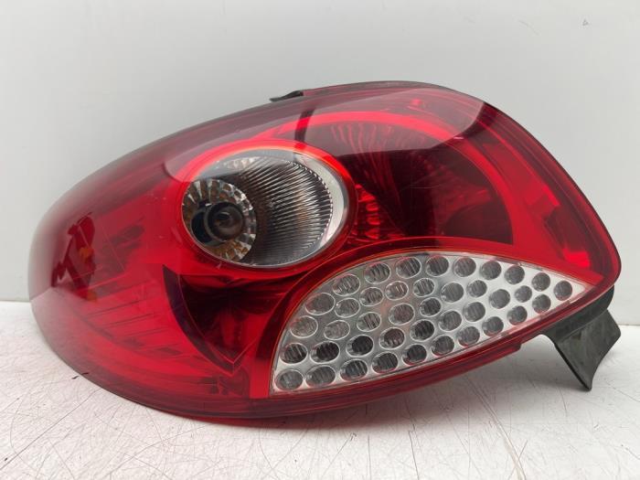 Feu arrière gauche d'un Peugeot 206 PLUS, -, 3 mois de garantie, Utilisé, -