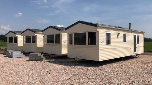 Te huur stacaravan / woonunit / unit / caravan, Caravans en Kamperen, Tot en met 4