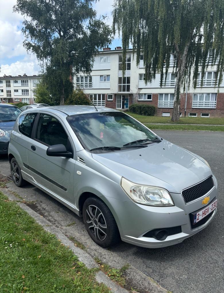 Chevrolet Caveo, Autos, Chevrolet, Particulier, Aveo, Boîte manuelle, Argent ou Gris, Gris, Tissu, Enlèvement