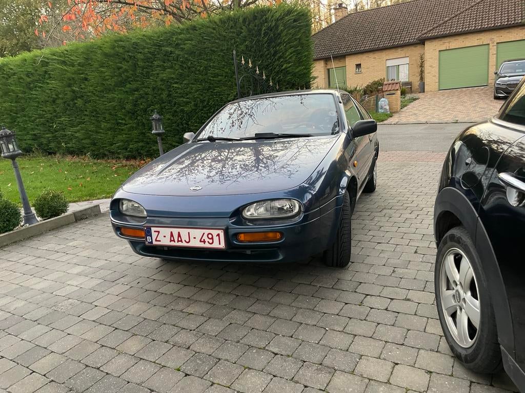 Nissan 100 nx 1600 cc zeer mooie 89.000 km als nieuw, Auto's, Nissan, Blauw, Bedrijf, Handgeschakeld, Onderhoudsboekje