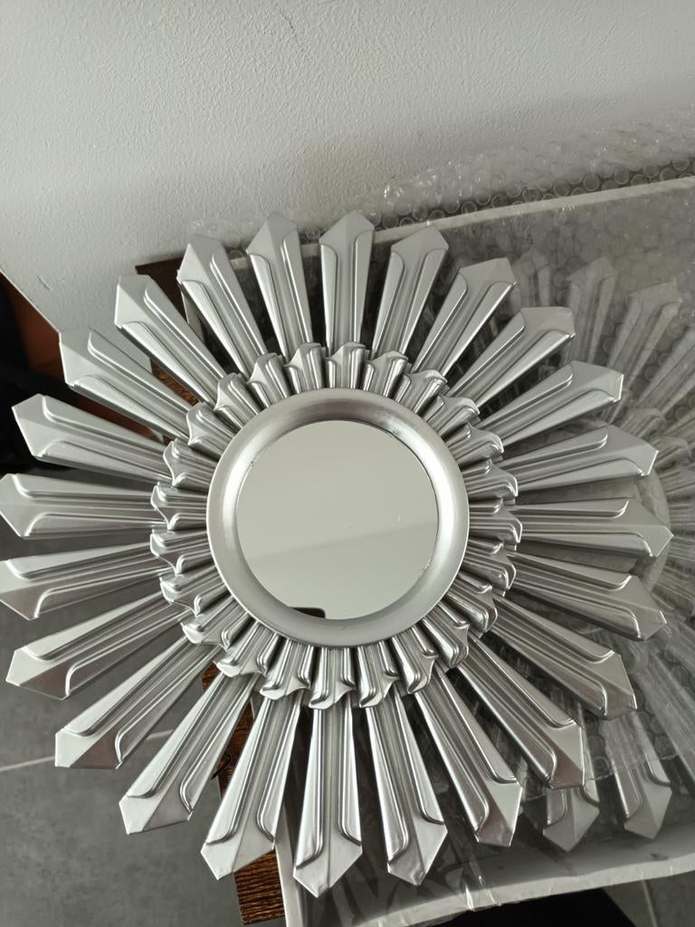 3 wandspiegels, Ophalen