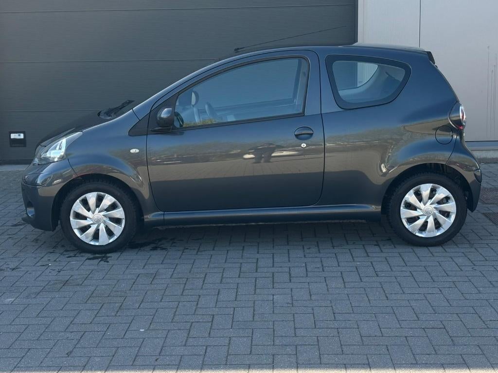 Toyota Aygo benzine airco 90.000km, Voorwielaandrijving, Euro 5, Stof, 50 kW