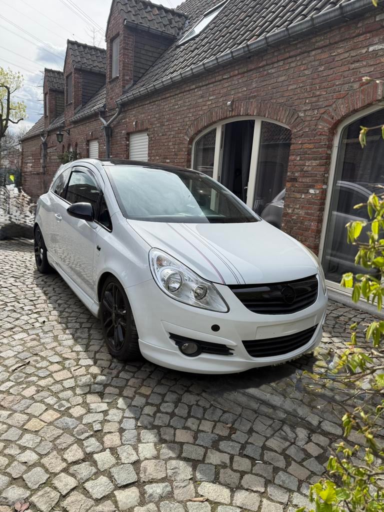 Opel Corsa D LIMITED EDITION, Auto's, Opel, Voorwielaandrijving, Zwart, 4 cilinders, Leder en Stof