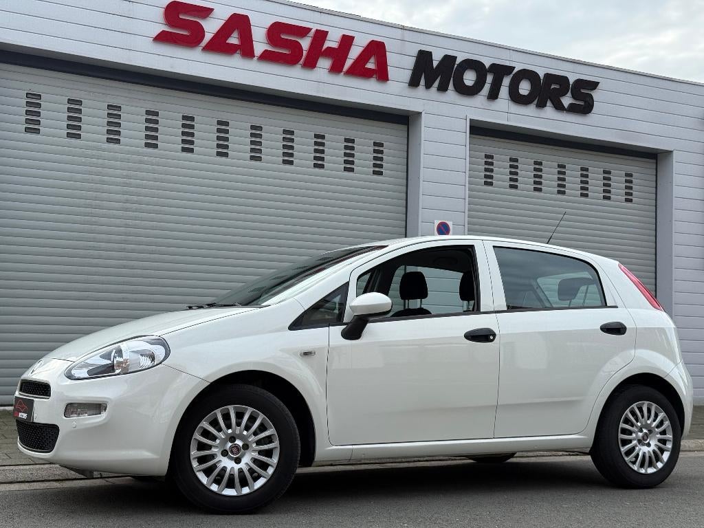 Fiat Grande Punto 1.2 Benzine '15 | 71.000 KM | 12MGarantie, Voorwielaandrijving, Stof, Grande Punto, Wit