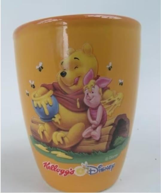 mok Kellogg's Disney Winnie the Poeh oranje, Verzamelen, Ophalen of Verzenden, Winnie de Poeh of vrienden, Gebruikt, Servies