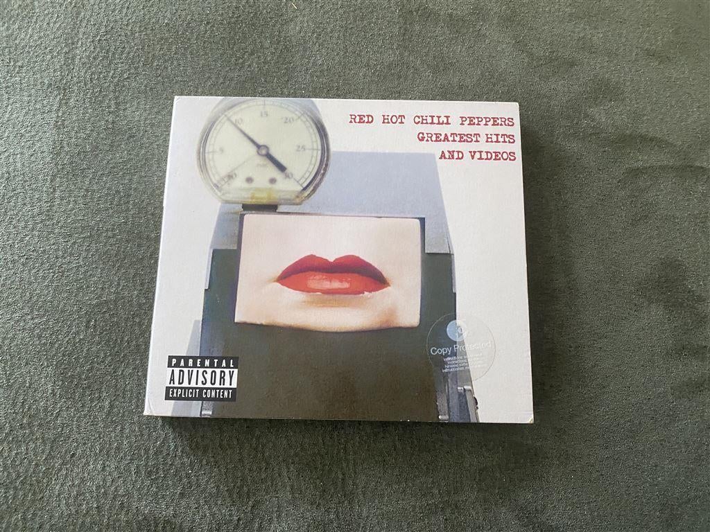 red hot chili peppers greatest hits and videos [ 79 ], Envoi, Comme neuf