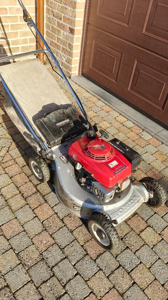 Benzine grasmaaier Honda hr194, Tuin en Terras, Grasmaaiers, Gebruikt, Benzine-grasmaaier, Cirkelmaaier, Opvangzak, Ophalen