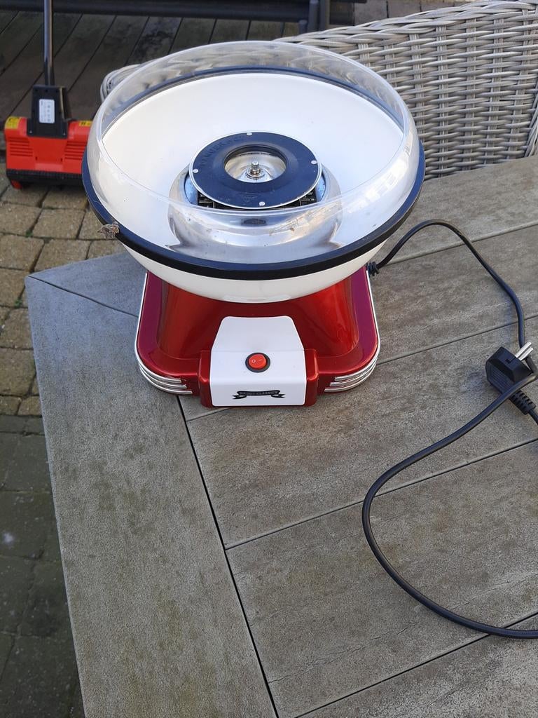 Suikerspinmachien, Ophalen