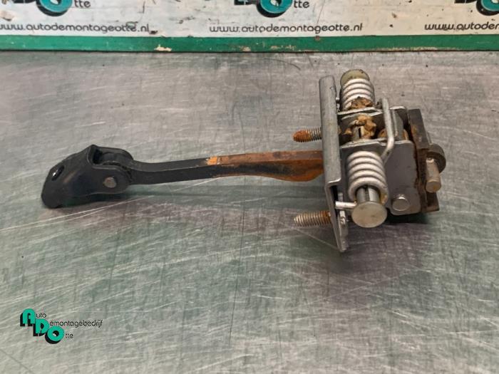 Butée 4portes arrière gauche d'un Citroen C4 (C4 10-), -, 3 mois de garantie, Utilisé, -