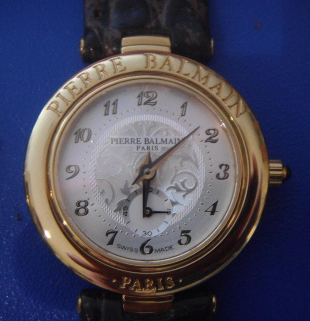 Montre dame Balmain, cadran blanc, plaqué or, arabesques, Collections, Collections Autre, Neuf, Enlèvement