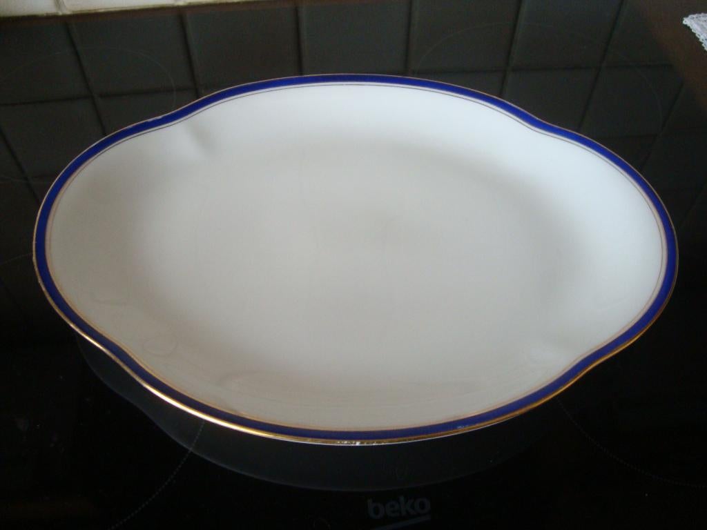 Gelobde, ovale schotel in Limogesporselein, Haviland., Enlèvement