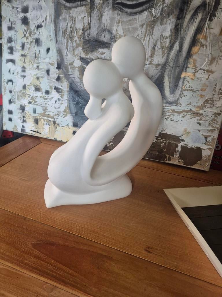 Sculptuur beeld De Kus, Ophalen