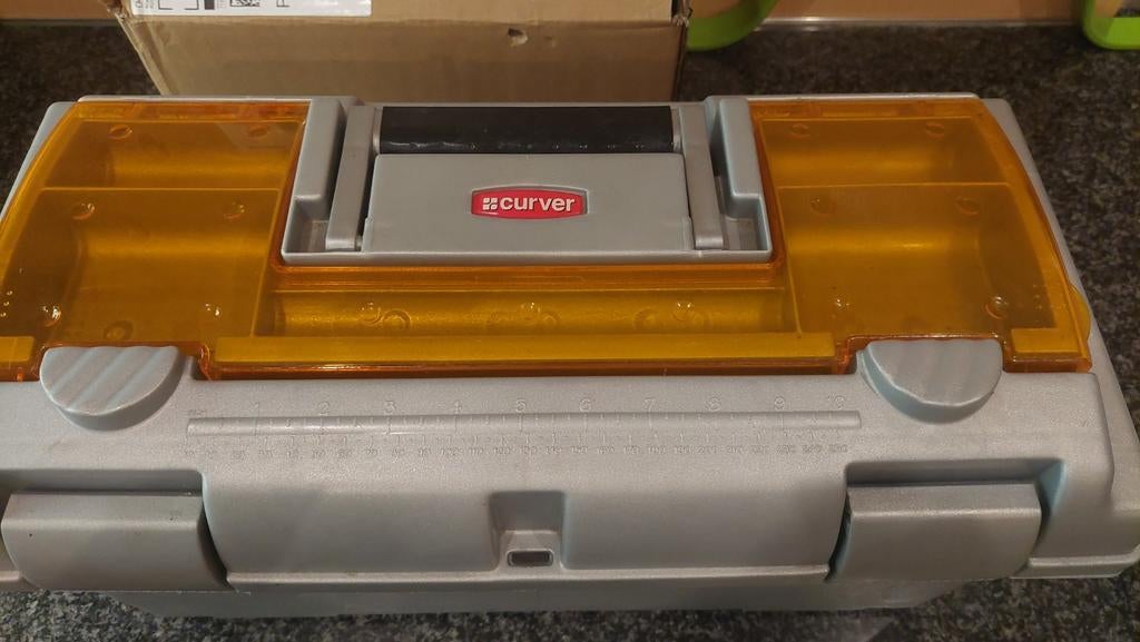 Knutsel- of gereedschapkoffer, Ophalen