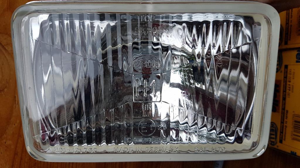 2 Optiques, projecteurs longue portée : HELLA 1KB 003 177-06, Autos : Pièces & Accessoires, Enlèvement ou Envoi, Neuf, Mitsubishi