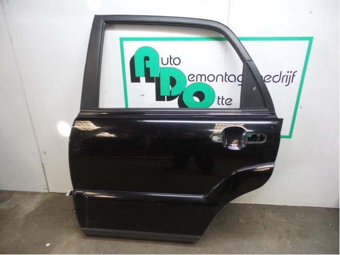 Portier 4Deurs links-achter van een Kia Sportage (Sportage 0, -, Deur, -, Ophalen of Verzenden
