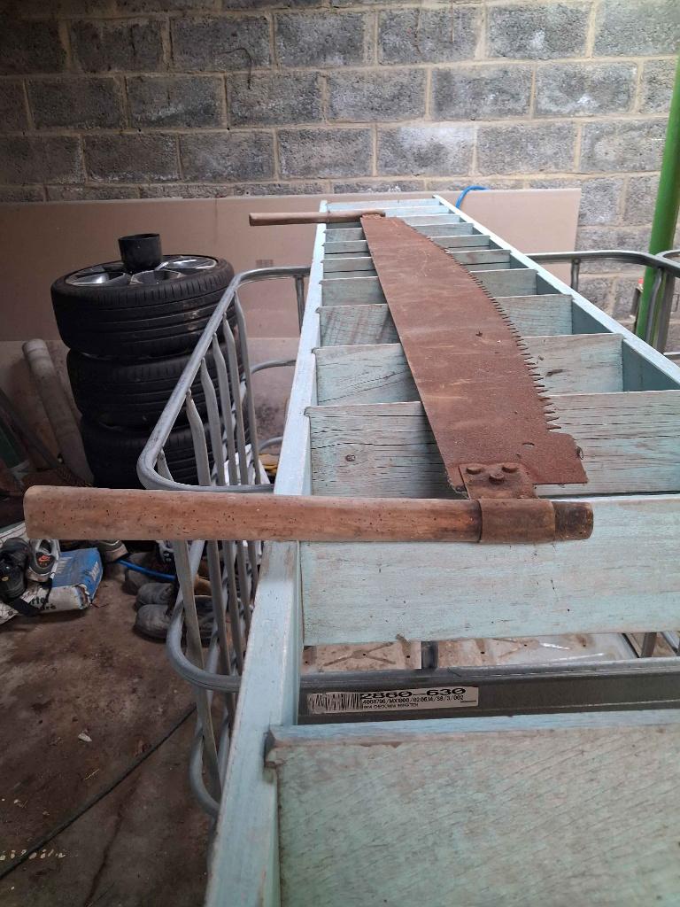 Ancienne scie a bois, Ophalen