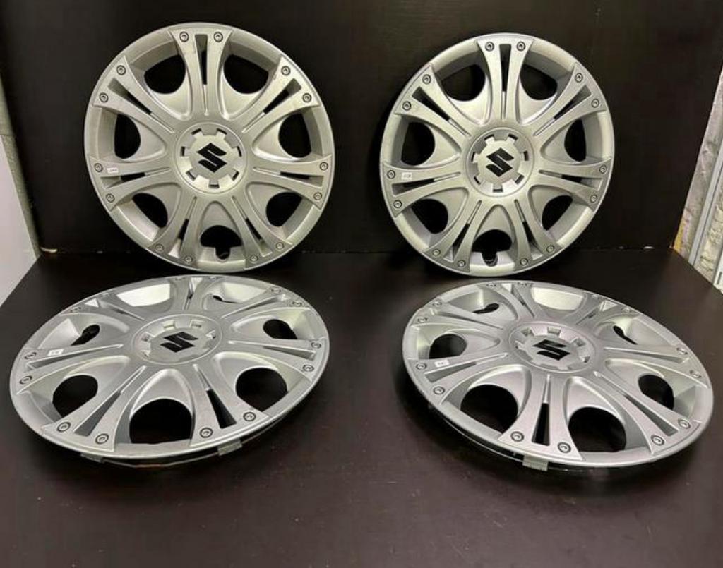 4 enjoliveurs d’origine Suzuki splash Swift 15", Autos : Divers, Enjoliveurs, Utilisé, Enlèvement ou Envoi
