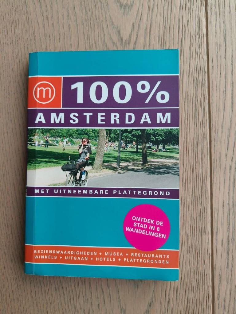 Reisgids 100% Amsterdam, Overige merken, Ophalen of Verzenden, Zo goed als nieuw, Reisgids of -boek