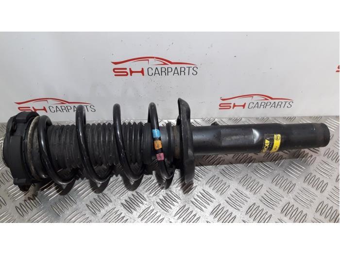 Schokdemperpoot links-voor van een Volkswagen Golf, Auto-onderdelen, Ophanging en Onderstel, Volkswagen, Gebruikt, 3 maanden garantie