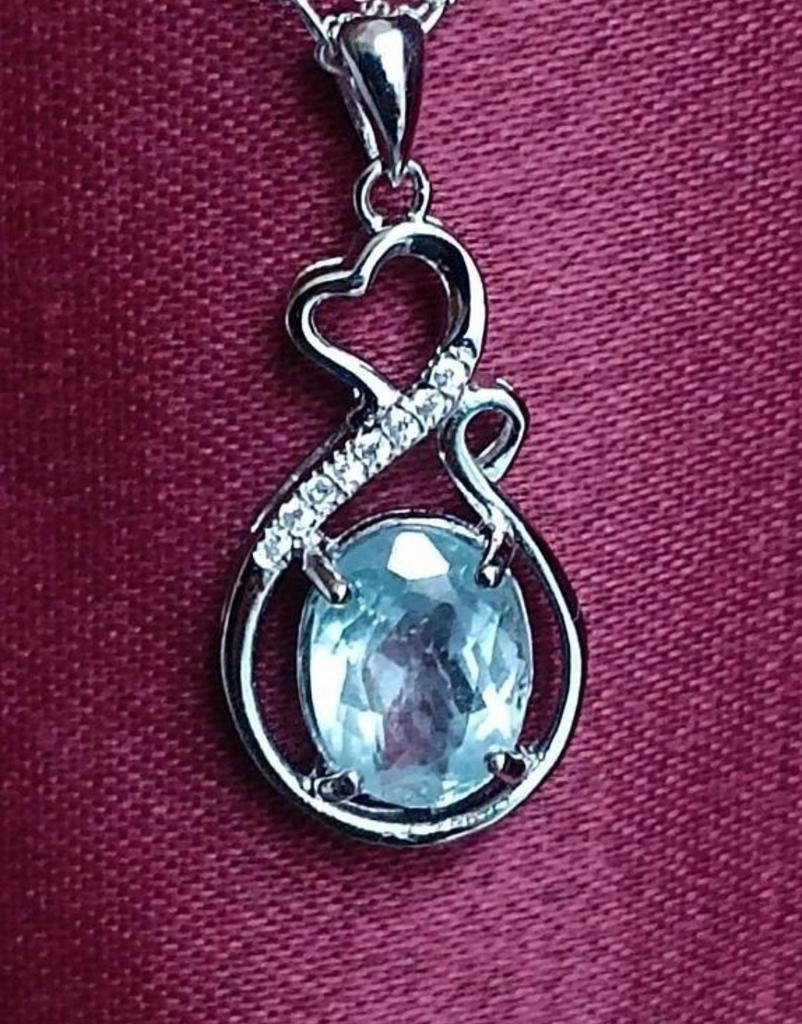 Pendentif en argent massif avec topaze bleue naturelle, Neuf, Enlèvement ou Envoi, Avec pierre précieuse, Bleu
