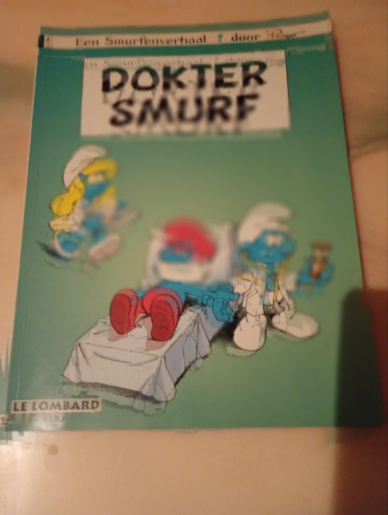 Couverture souple colorée représentant les Schtroumpfs., Une BD, Enlèvement ou Envoi, Utilisé, Casterman