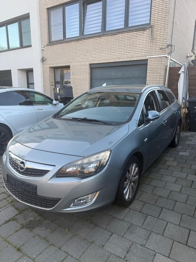Opel astra 2012, Auto's, Opel, Voorwielaandrijving, Euro 5, Stof, Zwart