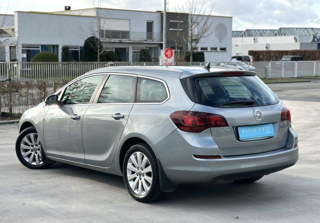 Opel Astra Sports 1.7 CDTI 62858km 1ste eigenaar GPS Cruise, Auto's, Opel, Euro 5, Bedrijf, 5 deurs, 119 g/km