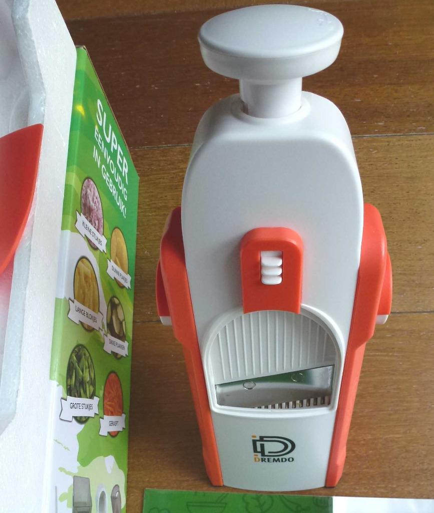 Mandoline groentensnijder - Drembo - Oranje kleur, Ophalen of Verzenden, Zo goed als nieuw, Overige materialen, Overige typen