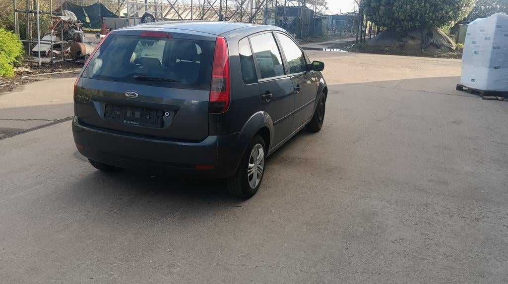 TE 
Te koop.

 Ford Fiesta 1.4 benzine met keuring en  12 ma, Euro 5, Stof, Zwart, 4 cilinders