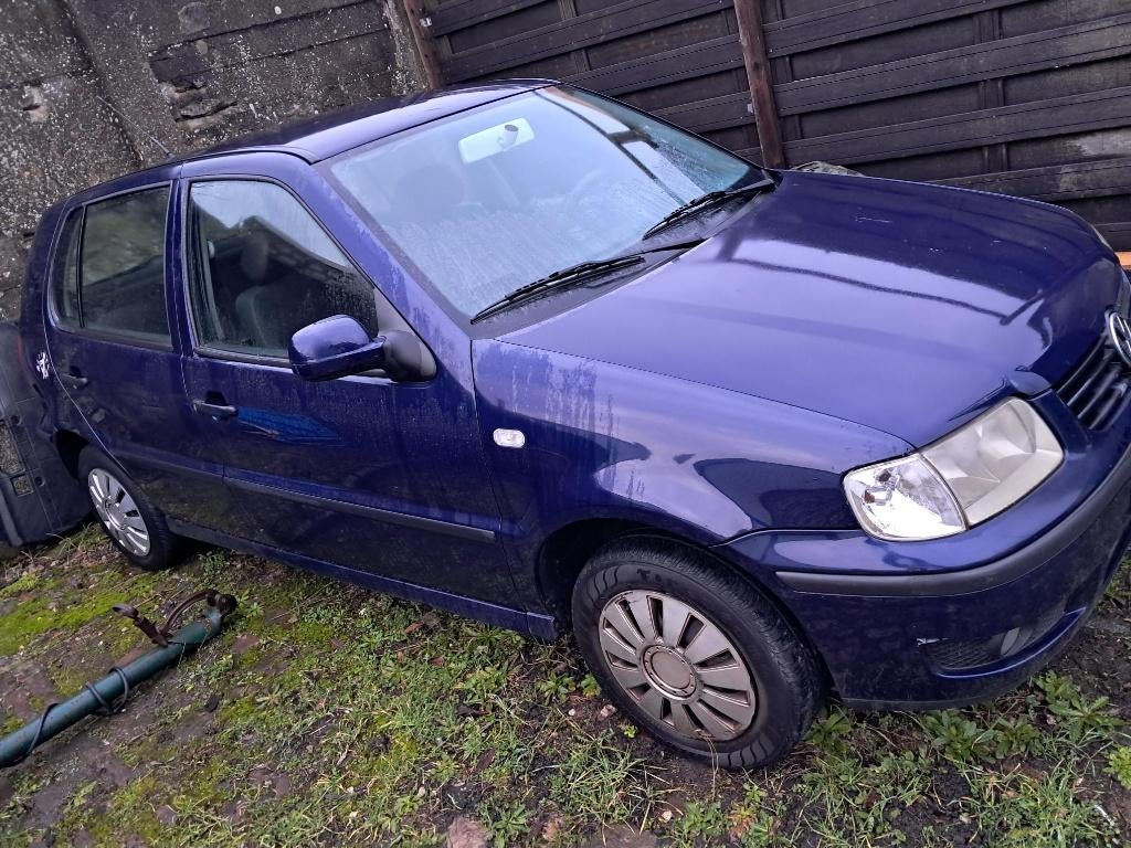 VW polo 1.4 benzine automaat export, Auto's, Volkswagen, Stof, 50 kW, Zwart, 4 cilinders