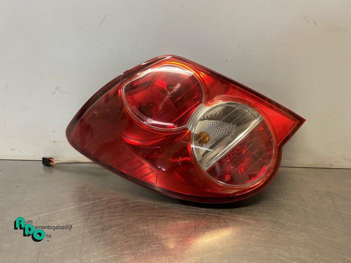 Feu arrière gauche d'un Chevrolet Aveo (Aveo 11-), -, 3 mois de garantie, Utilisé, -