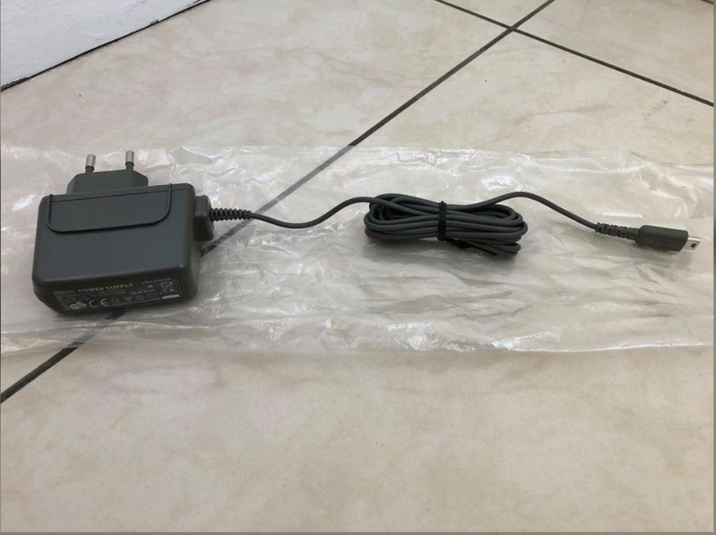 Officiële Nintendo DS lite-oplader - nieuw, Games en Spelcomputers, Ophalen of Verzenden, Nieuw