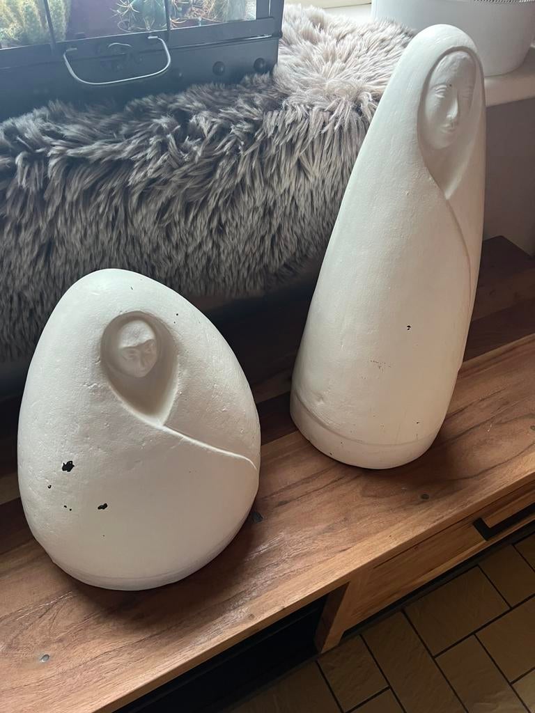 Twee terracotta beelden, Ophalen