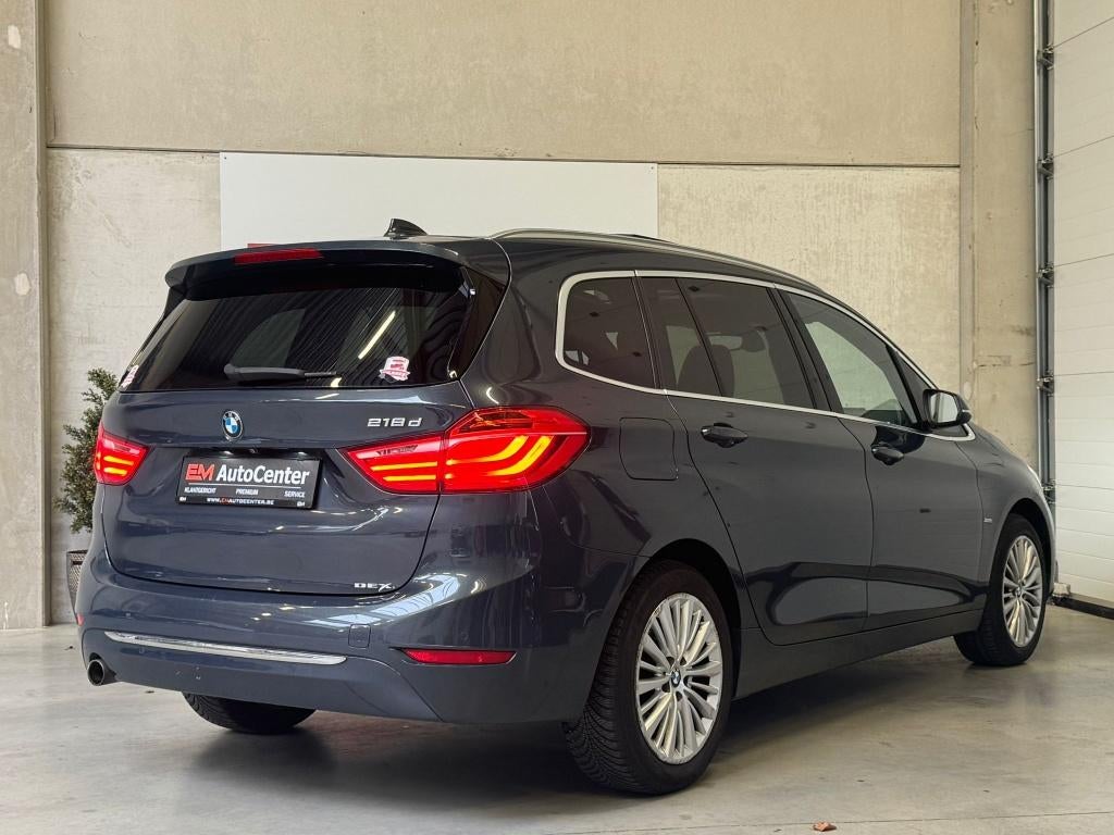 BMW 218 Gran Tourer Automaat-7PL-Pano-CAM-HUD-Keyless-Memory, Auto's, BMW, Monovolume, 4 cilinders, Blauw, 7 zetels