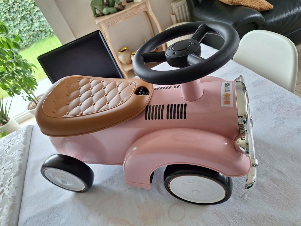 Nieuwe roze loopauto, Ophalen