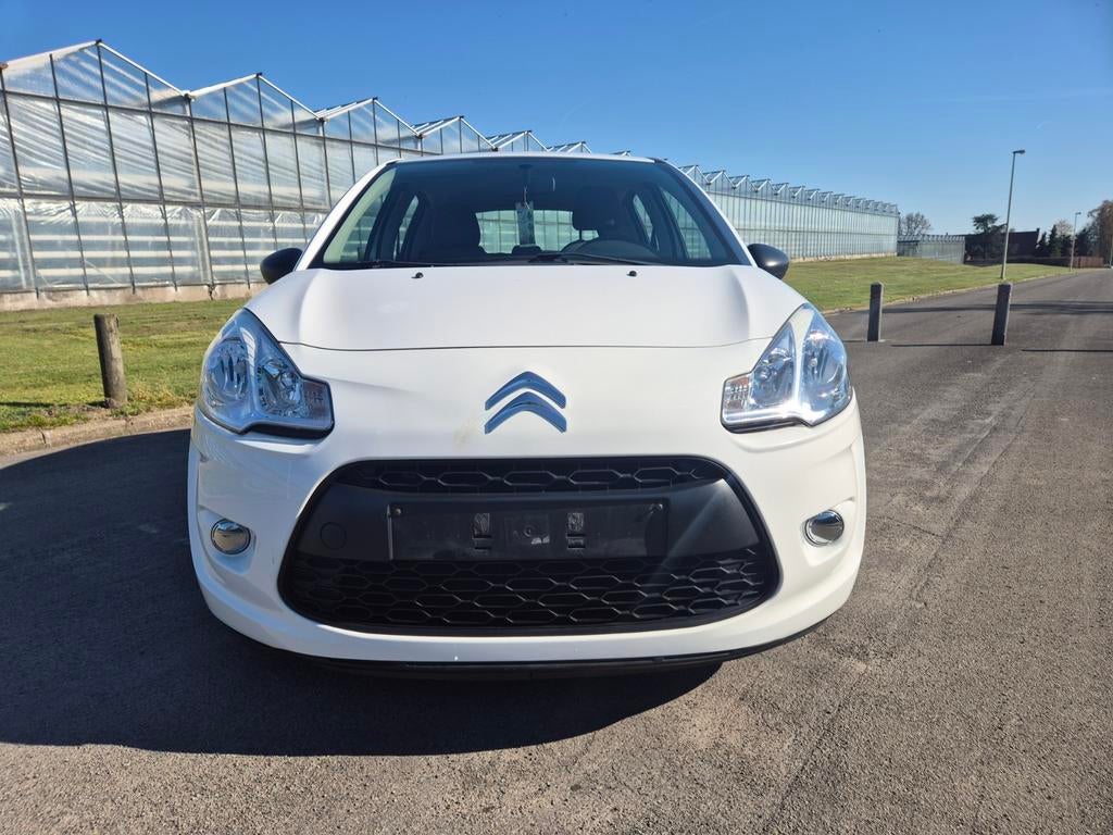 Citroen C3 1.1 benzine 50dkm bj 2012 wordt Gekeurd Vvk, Auto's, Euro 5, Stof, Zwart, 4 cilinders
