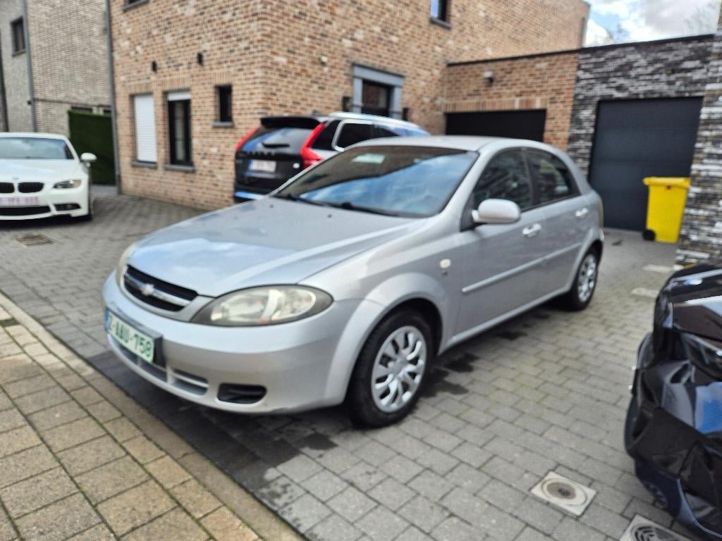 Chevrolet Lacetti / Opel Astra 1.4benzine 5drs AC 62.000kms, Argent ou Gris, Entreprise, 5 portes, 165 g/km