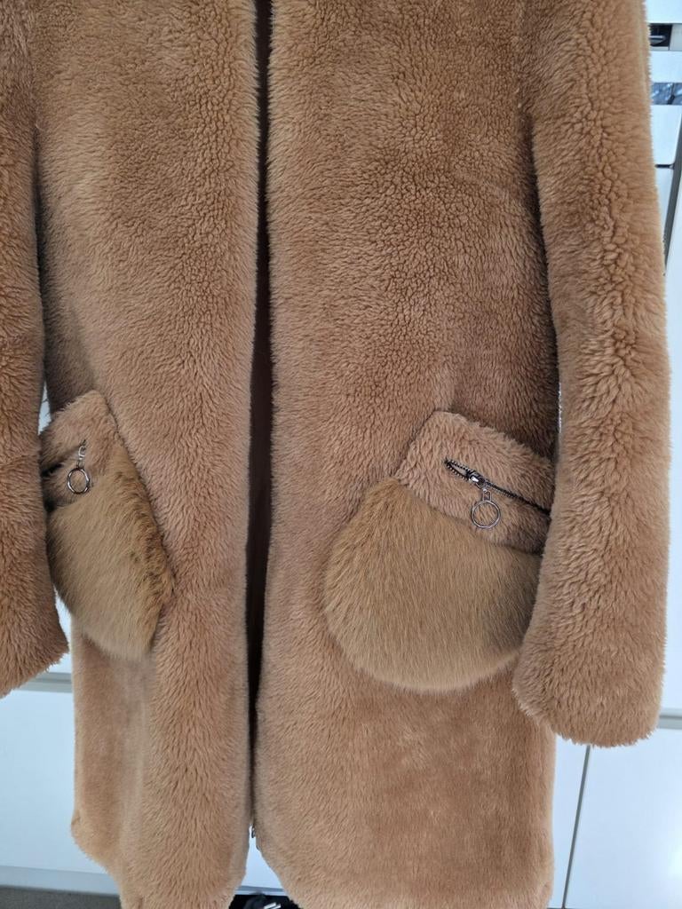 Wollen jas., Ophalen