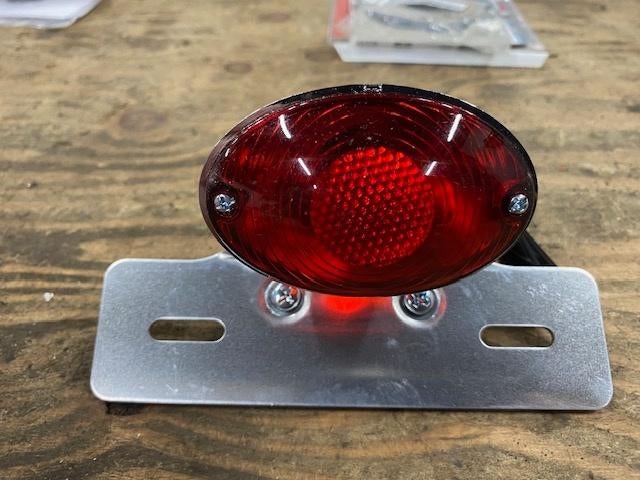 Nieuw bromfiets achterlicht CAT eye, Ophalen, Nieuw