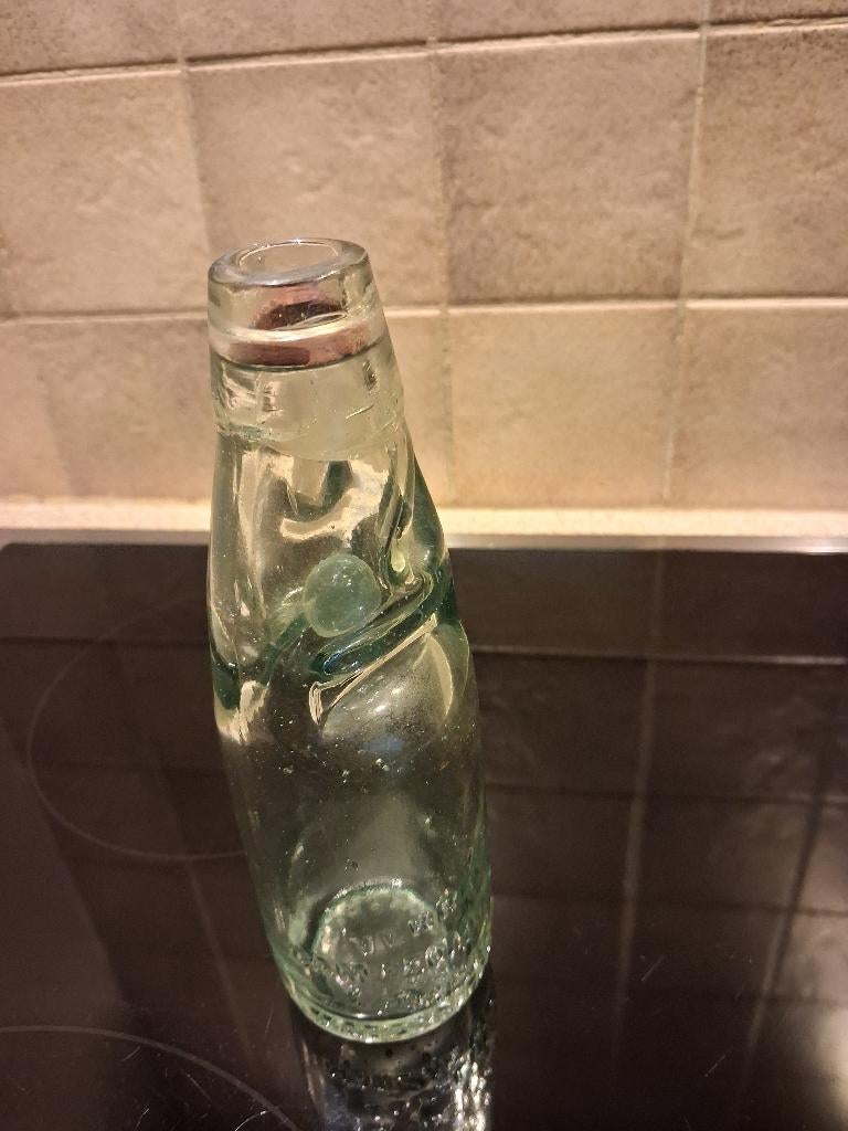 Antiek kogelflesje, Ophalen