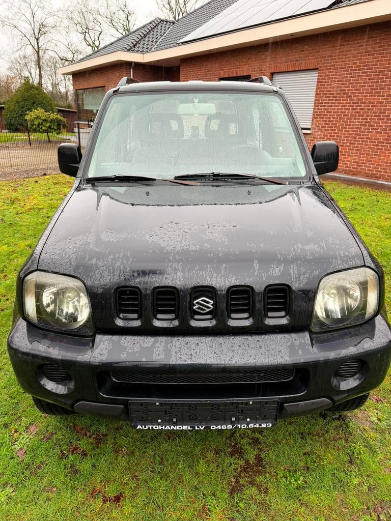 Suzuki Jimny JLX*1.3Benzine*4x4*, Auto's, Suzuki, 4 zetels, 63 kW, Zwart, Bedrijf