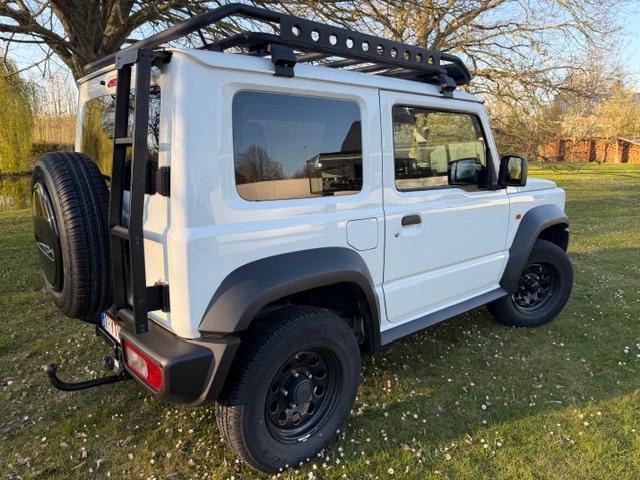 4x4 Suzuki Jimny GL  4 zitplaatsen! 41 000km & showroomstaat, Stof, 4 cilinders, Wit, Parkeersensor
